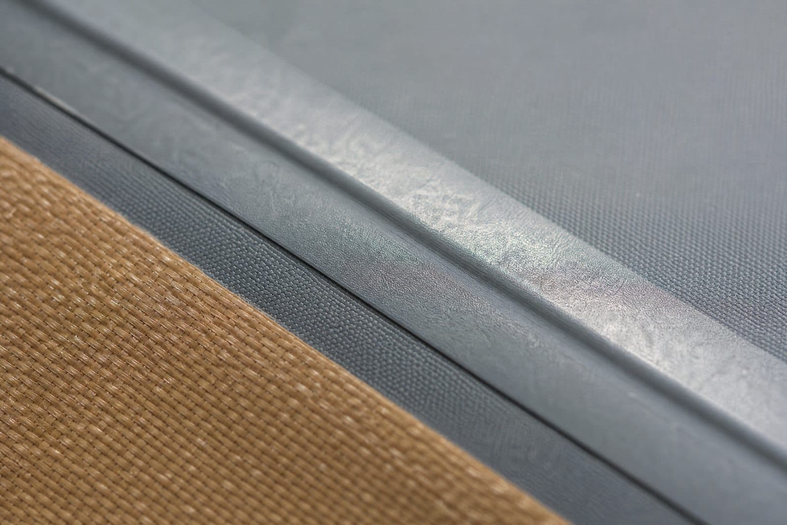 A high-frequency welded seam: a smooth fused ridge with no stitching and no needle holes.