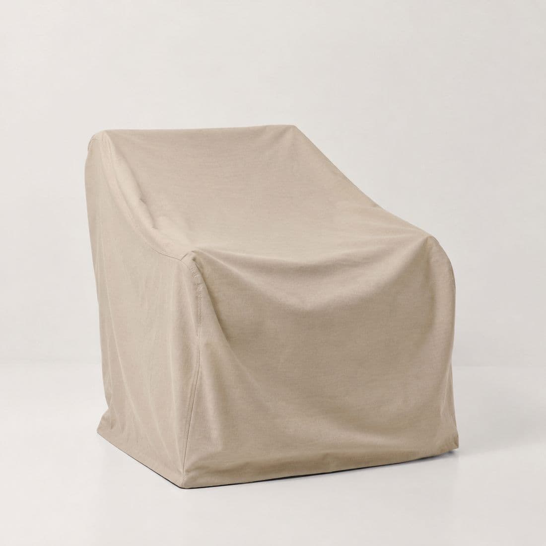 Chair Cover W1: One outdoor chair, kept clean under a roof between uses.