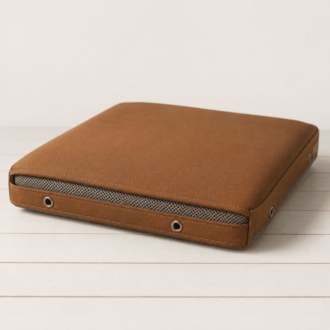 Cushion Cover Premium, The coated face, the quick-dry liner and the drainage grommets in one cover, for a cushion in salt air that gets used constantly.